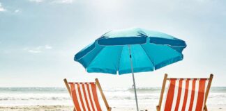 portable beach chairs for lounging in the sand and sun