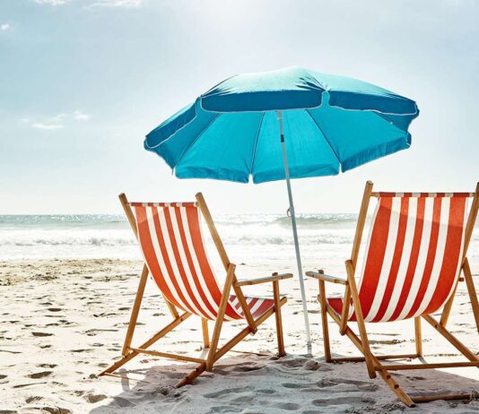 portable beach chairs for lounging in the sand and sun