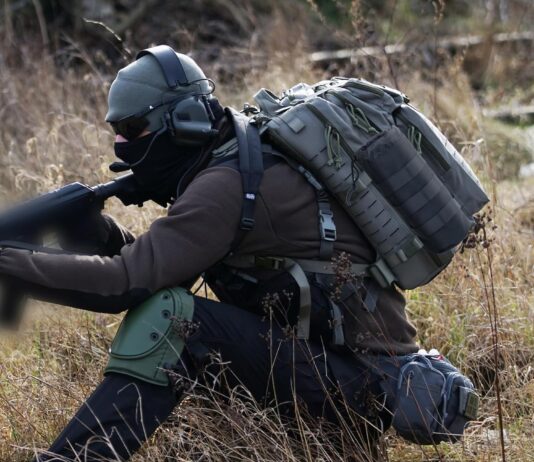 comparing 5 tactical gear water bottle pouch admin pouch fish lip gripper carabiner clip and quest vest